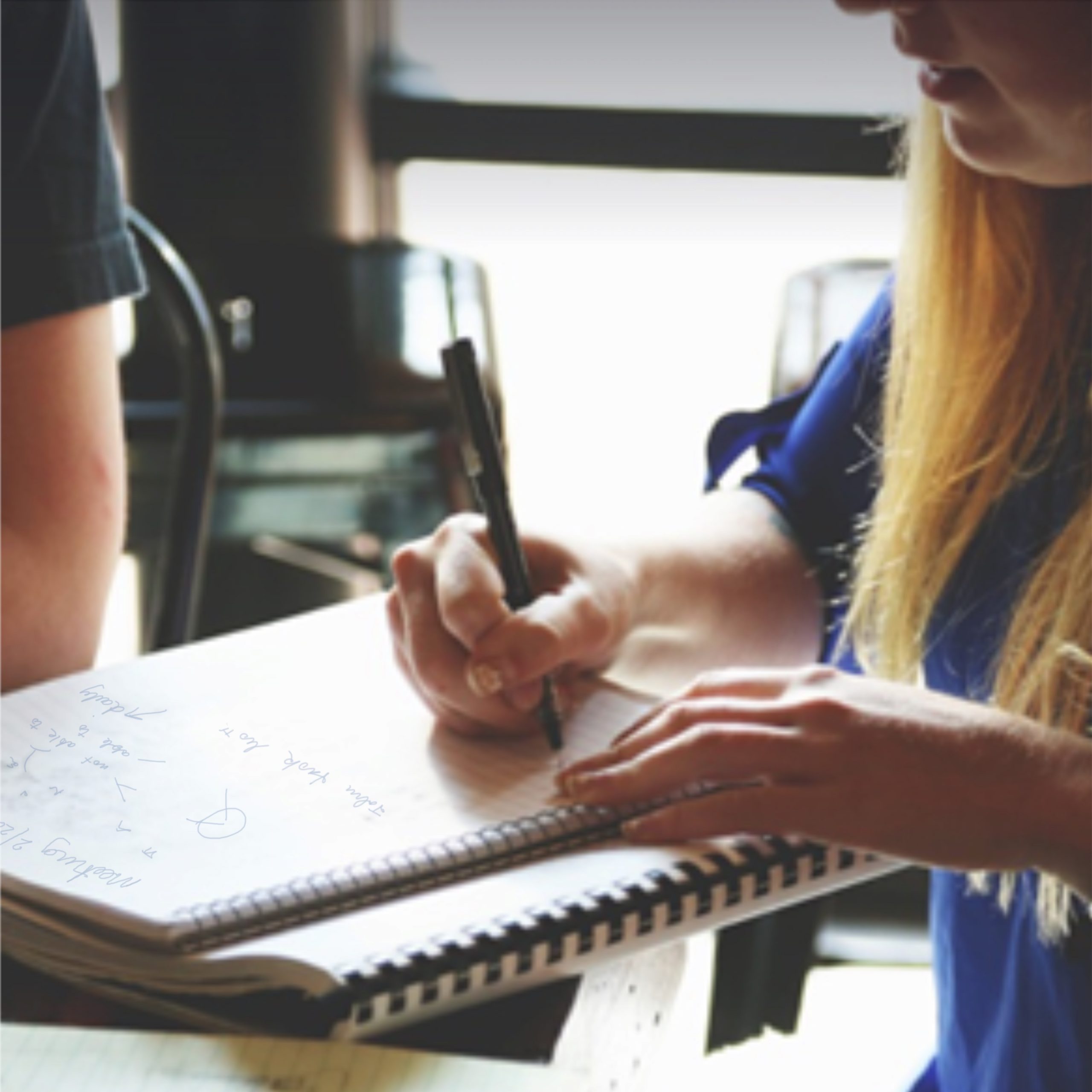 Close-up of a moisture analyzer in a coffee lab next to a printed data sheet and pencil, representing detailed coffee business planning.
